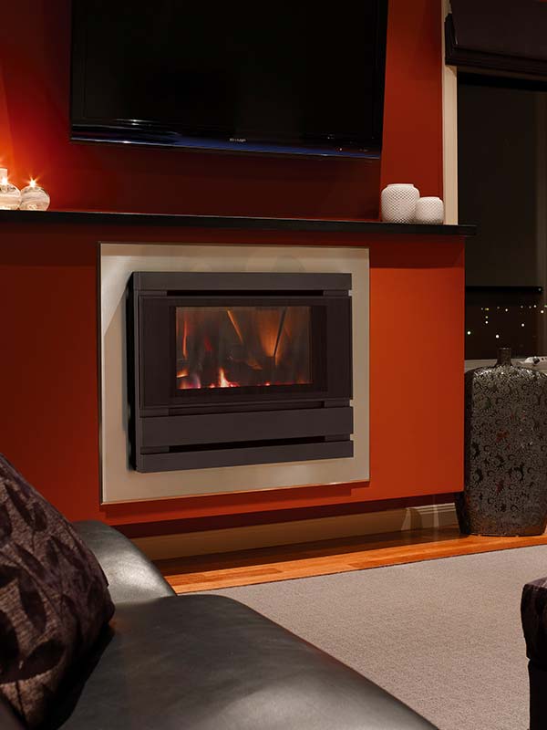 Cannon Fitzroy Powerflue Gas Log Fire in Black 4 Sided in a Red fireplace