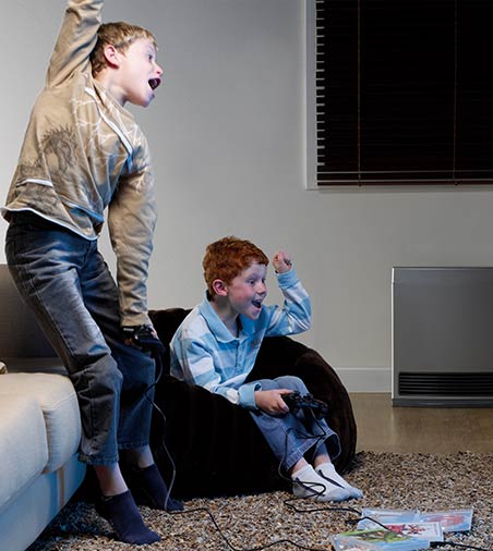 Family Room with Rinnai Enduro 13 Portable Gas Convector Heater